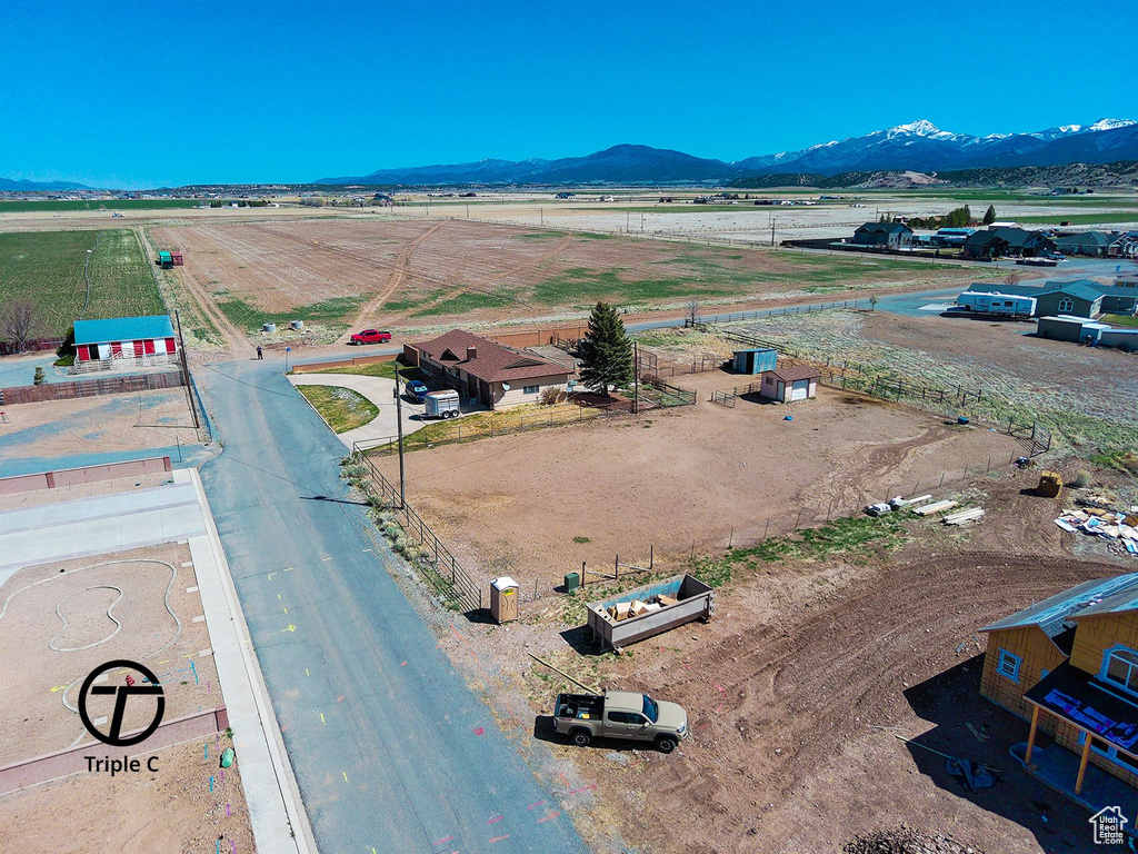 Birds eye view of property featuring a rural view and a mountain view