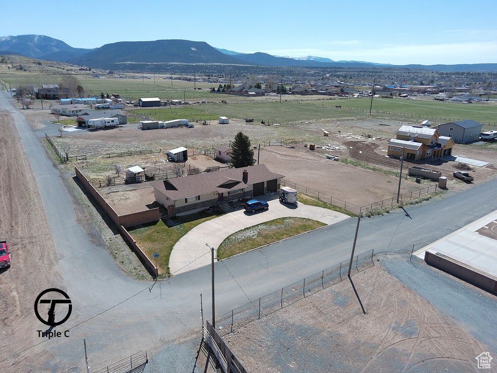 Birds eye view of property featuring a rural view and a mountain view
