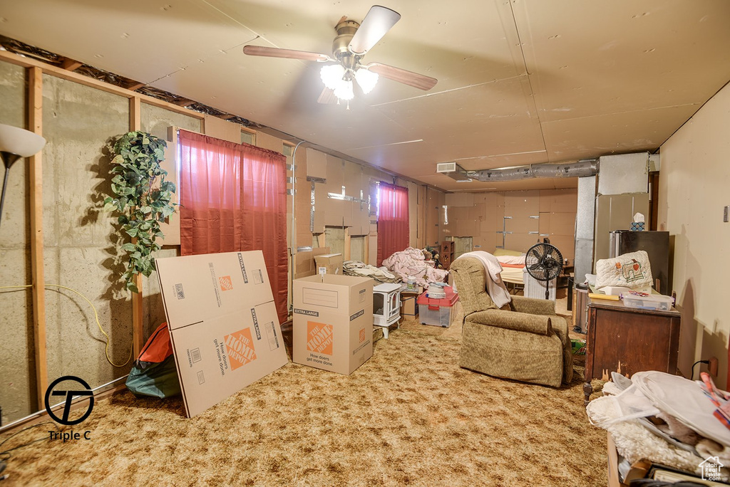 Below grade area with visible vents and ceiling fan