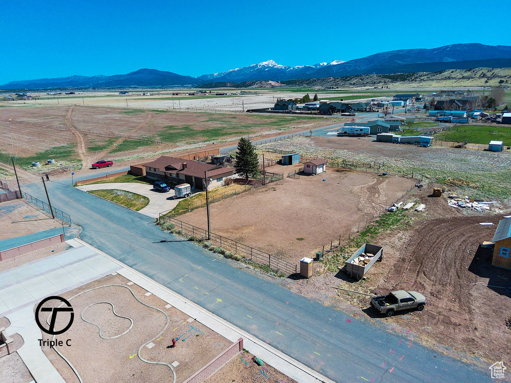 Drone / aerial view with a rural view and a mountain view