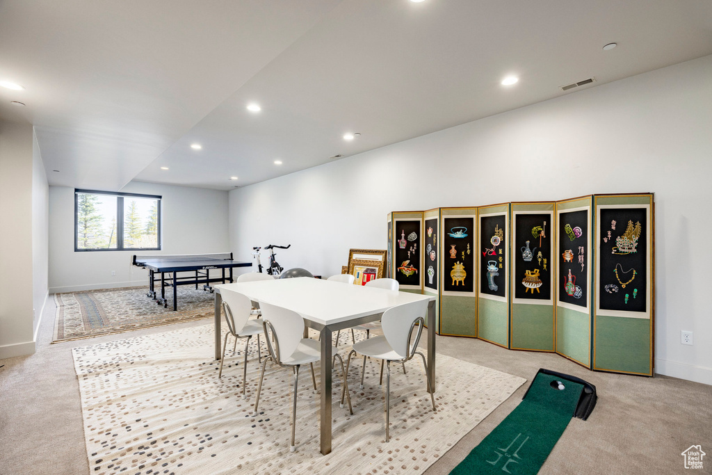 Dining area with recessed lighting, visible vents, light colored carpet, and baseboards