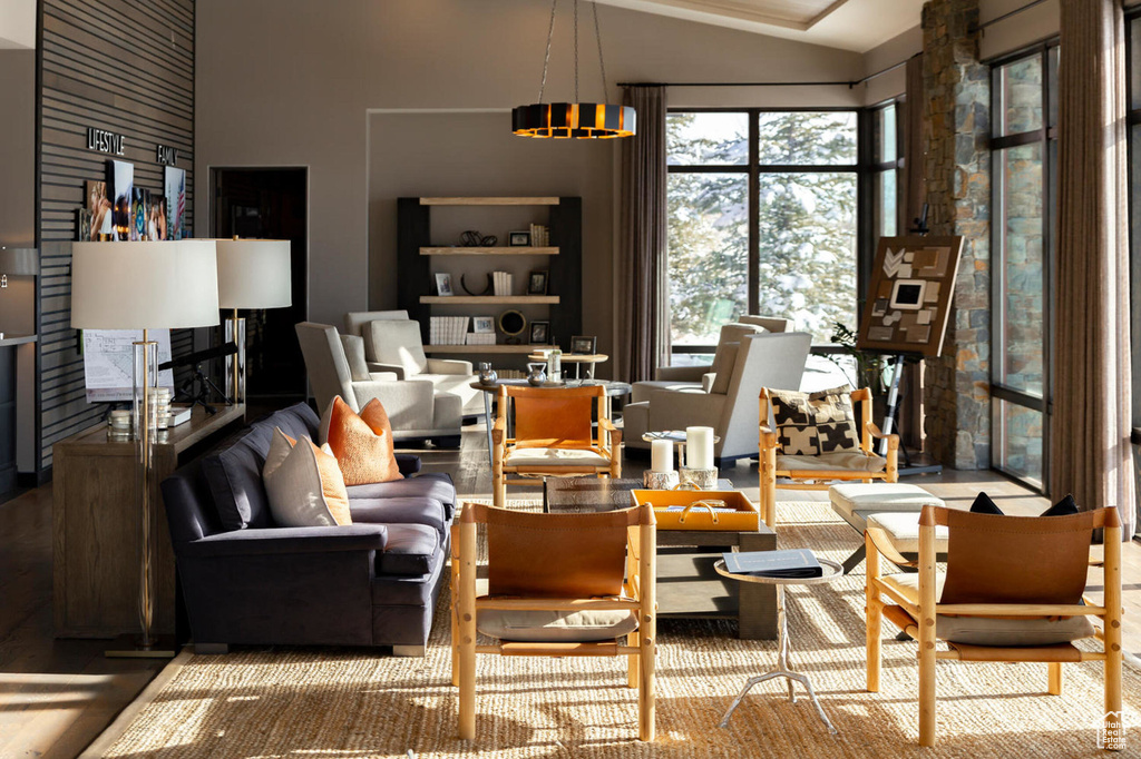 Living room with high vaulted ceiling