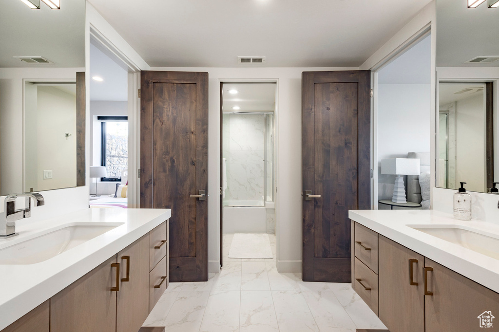 Full bathroom with a sink and visible vents