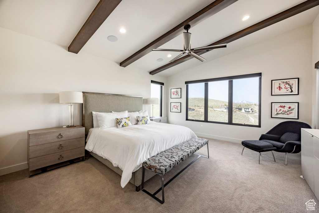 Bedroom featuring carpet flooring, baseboards, vaulted ceiling with beams, and recessed lighting