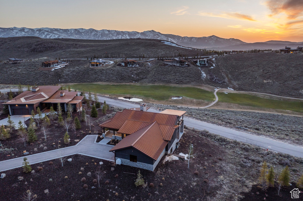 Aerial view at dusk with a mountain view