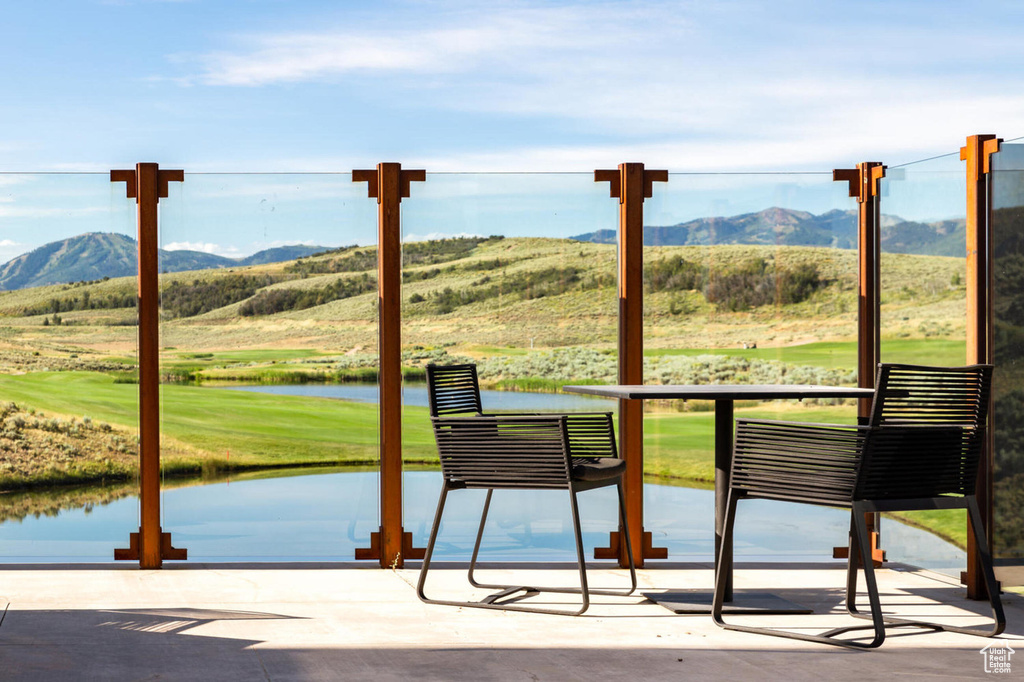 Exterior space with a healthy amount of sunlight and a water and mountain view