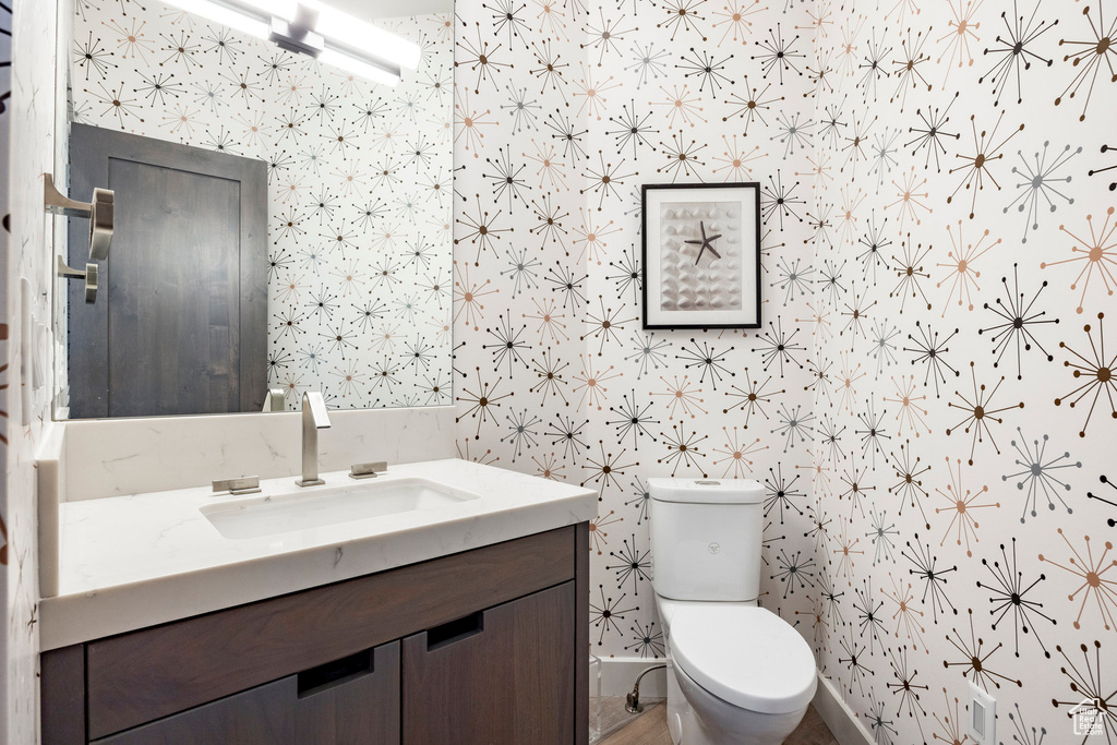 Bathroom featuring toilet and vanity