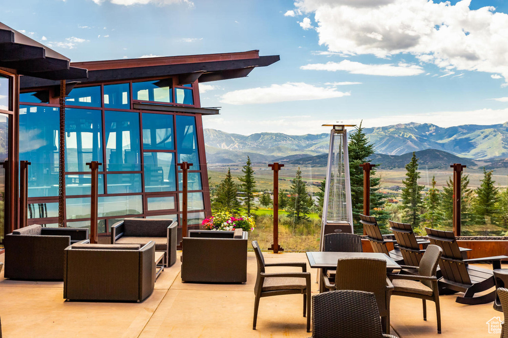 View of patio featuring a mountain view, outdoor lounge area, and outdoor dining area