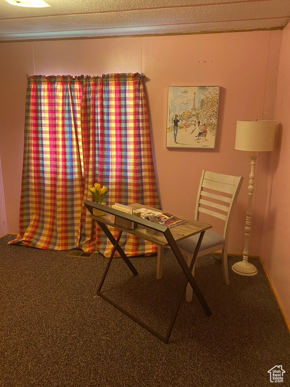 View of carpeted dining space