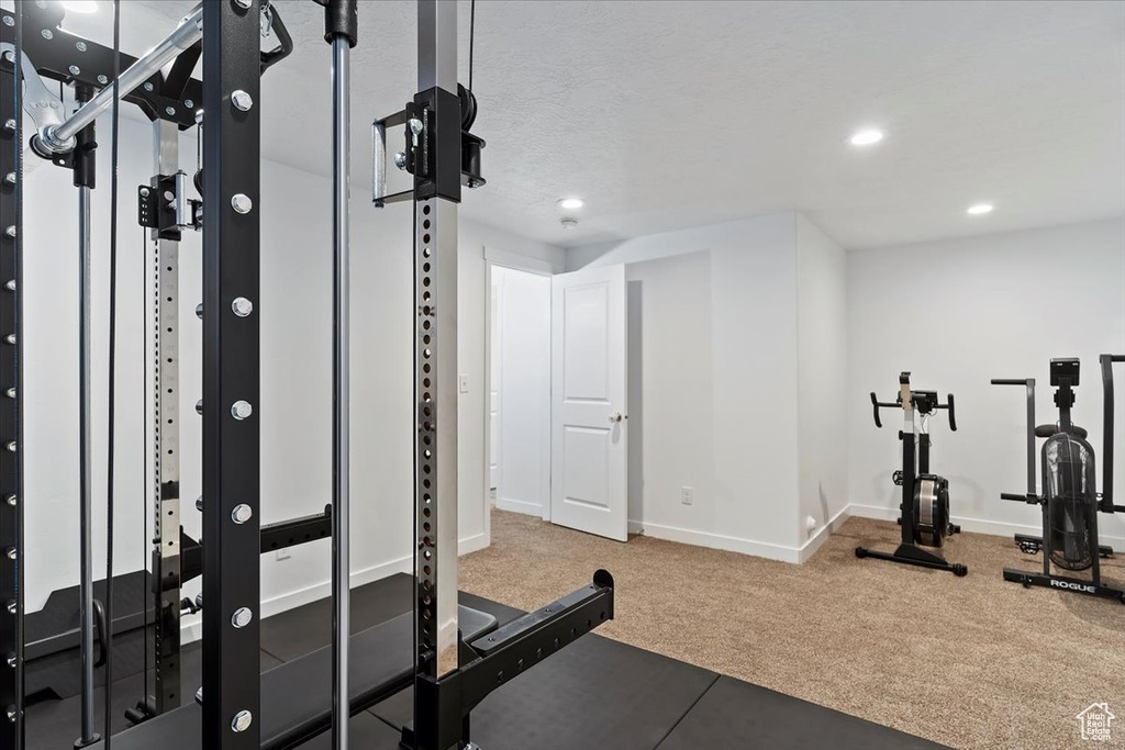 Workout room with recessed lighting, carpet flooring, and baseboards