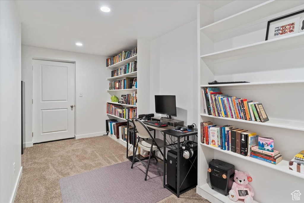 Carpeted office featuring recessed lighting and baseboards