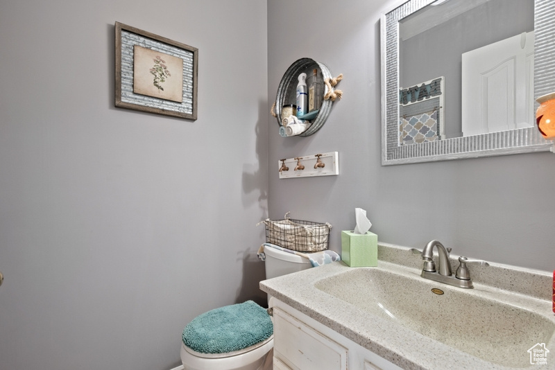 Bathroom with toilet and vanity
