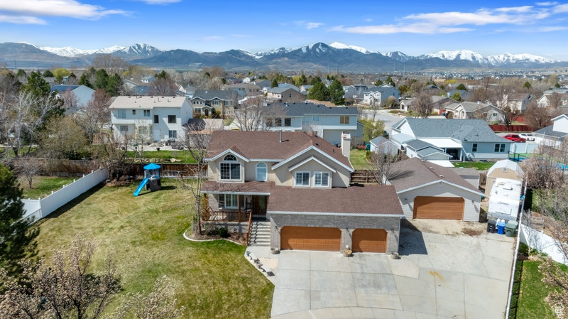 Drone / aerial view with a mountain view and a residential view