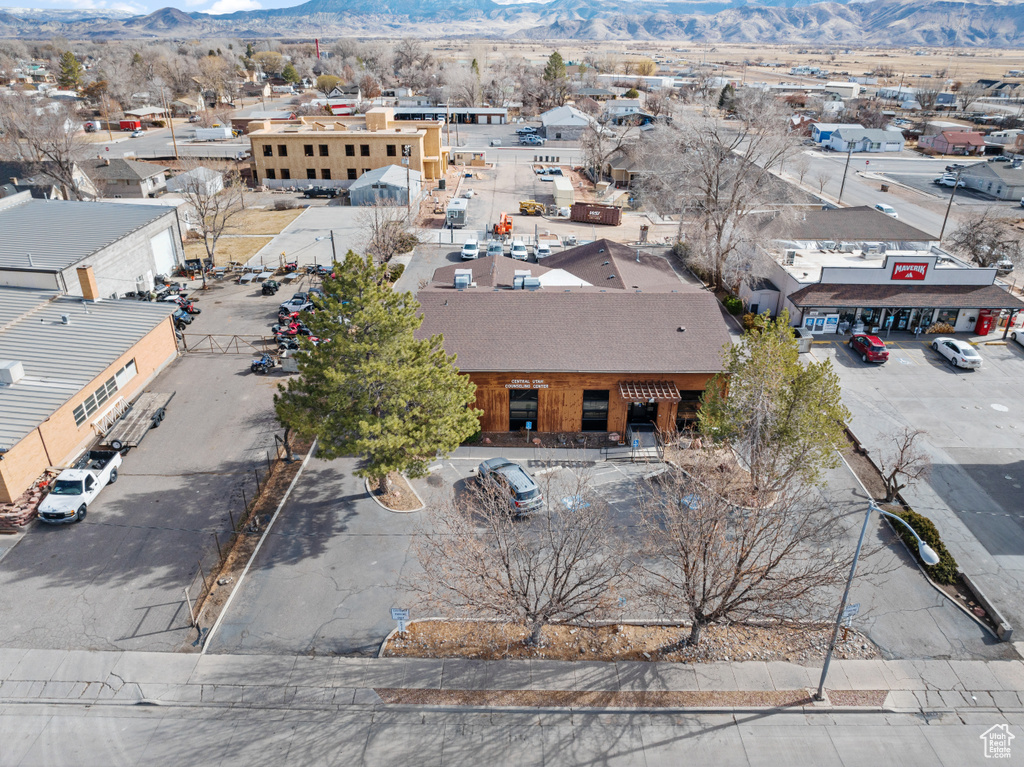 Drone / aerial view with a mountain view and a residential view