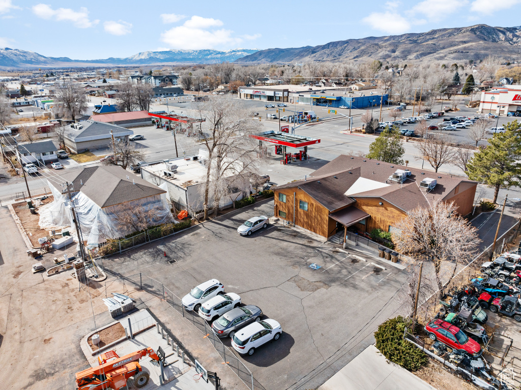 Birds eye view of property with a mountain view