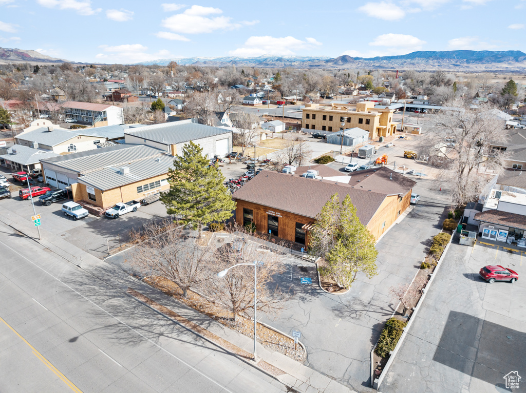 Birds eye view of property with a mountain view