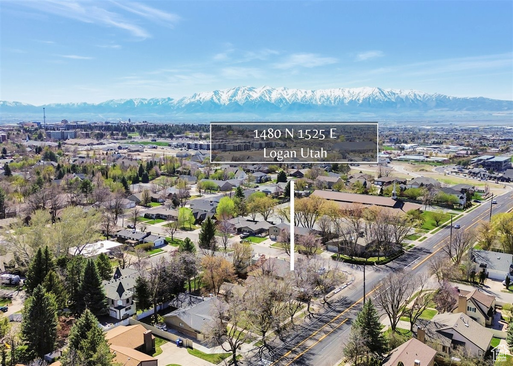 Aerial view featuring a residential view and a mountain view