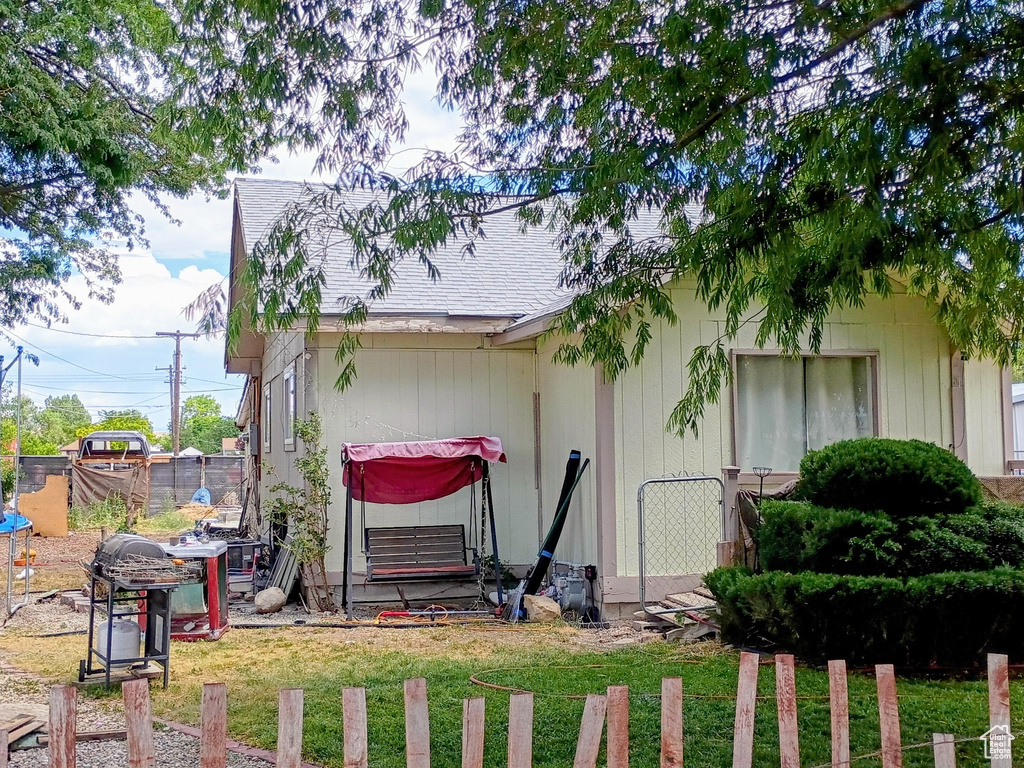 View of side of property featuring a trampoline