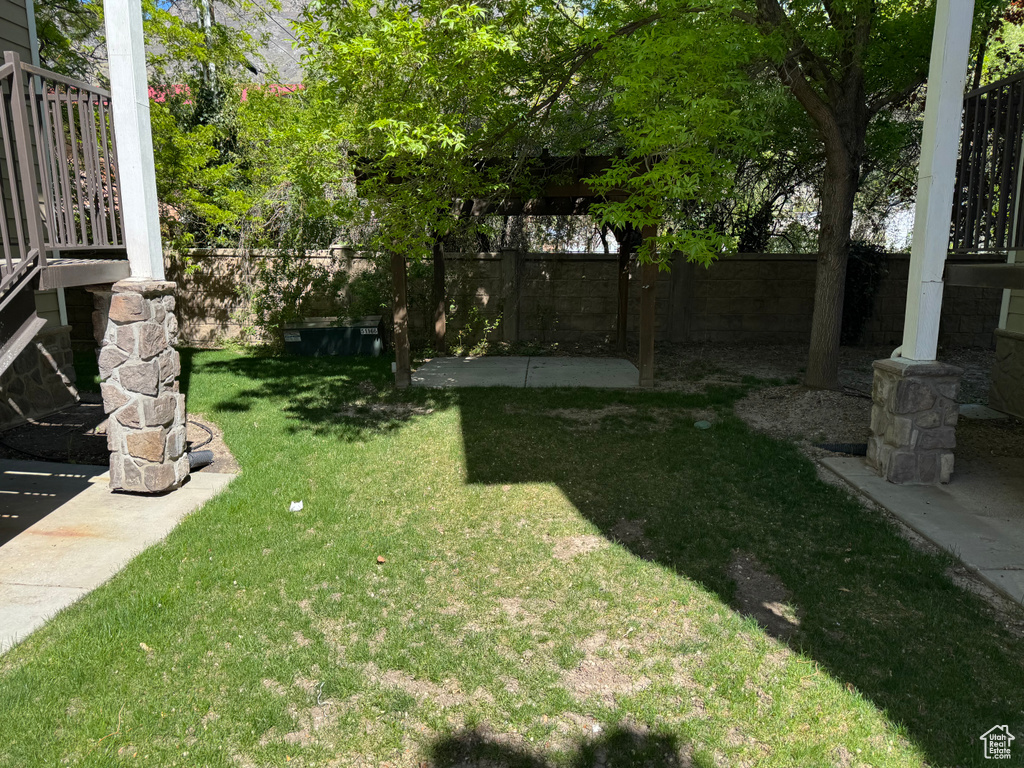 View of yard with a fenced backyard