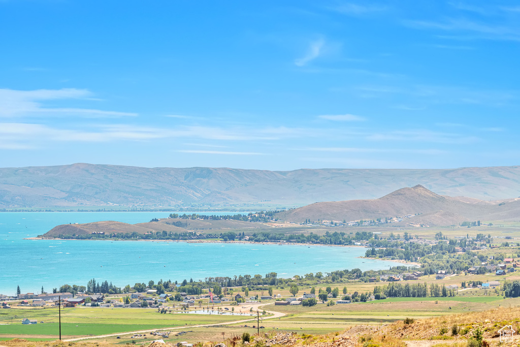Mountain view featuring a water view