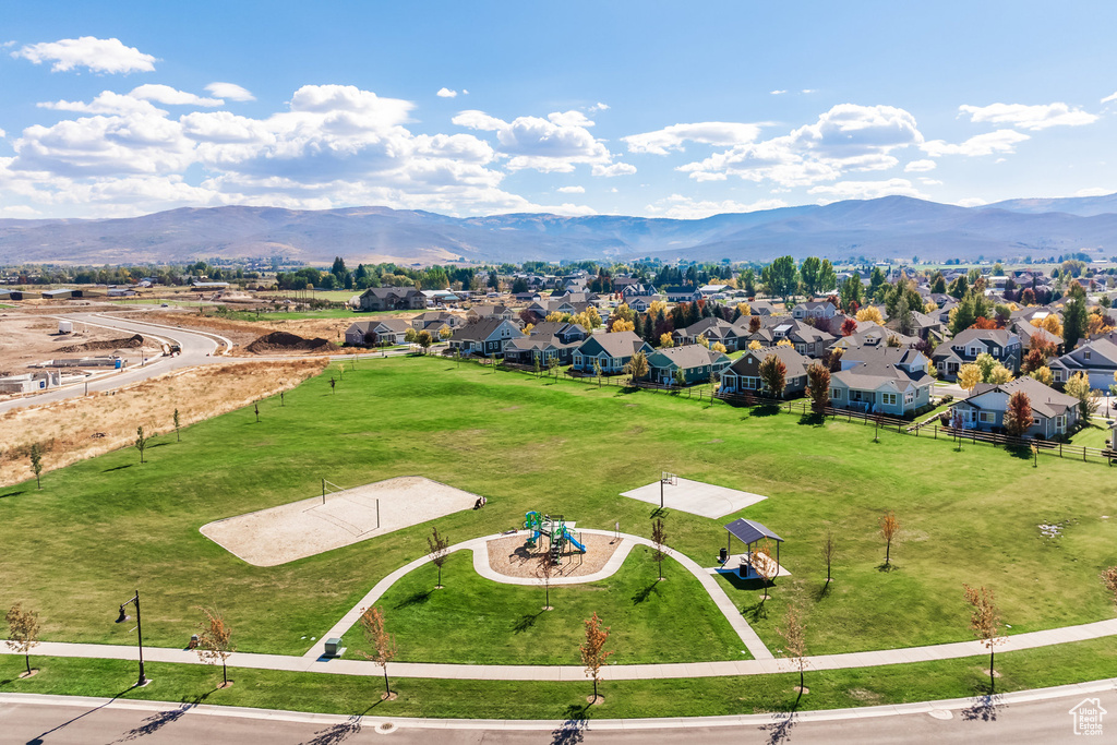 Aerial view featuring a mountain view and a residential view