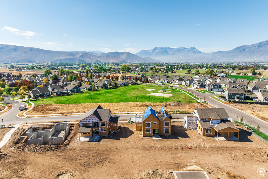 Birds eye view of property with a residential view and a mountain view
