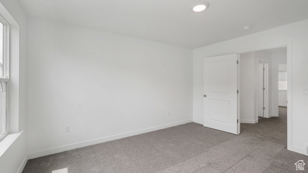 Unfurnished bedroom featuring carpet flooring