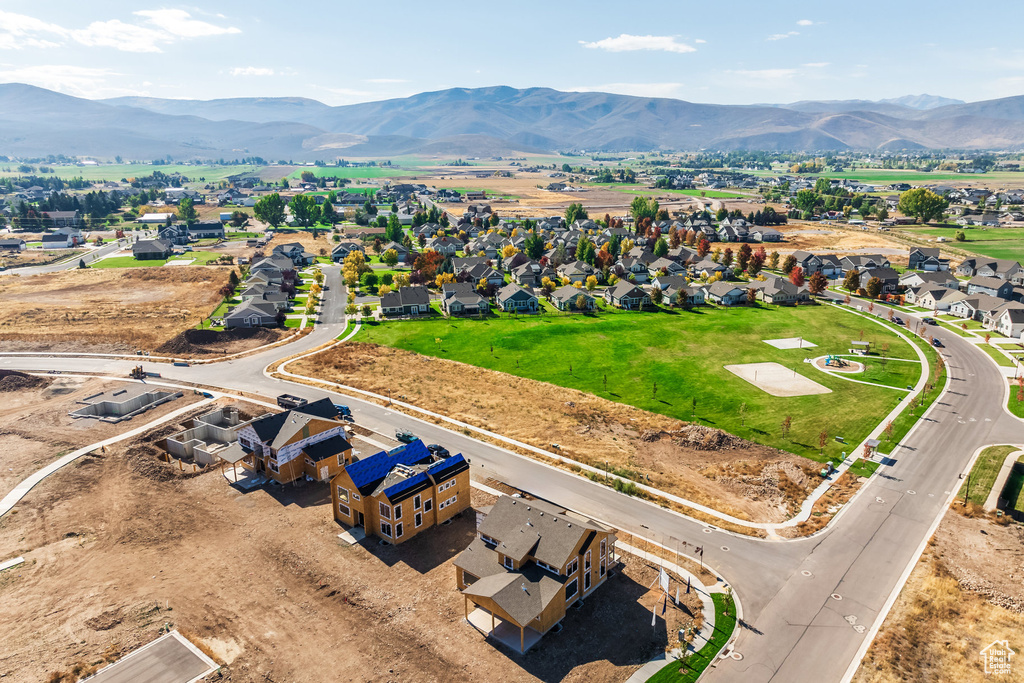 Aerial view featuring a mountain view and a residential view