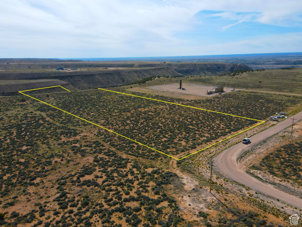 Birds eye view of property featuring a rural view