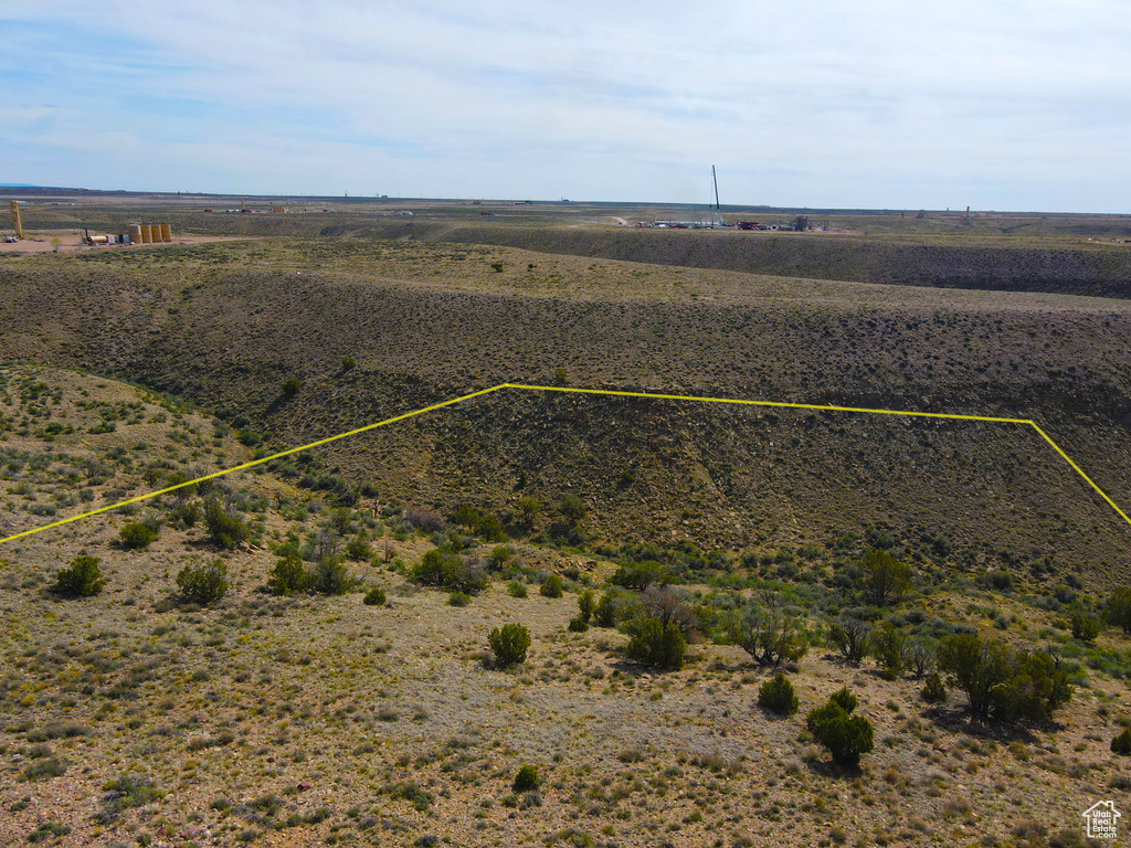 Birds eye view of property with a rural view