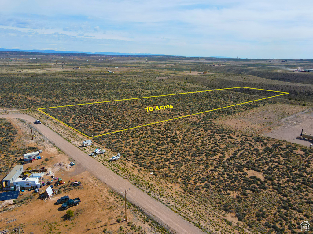 Birds eye view of property featuring a rural view