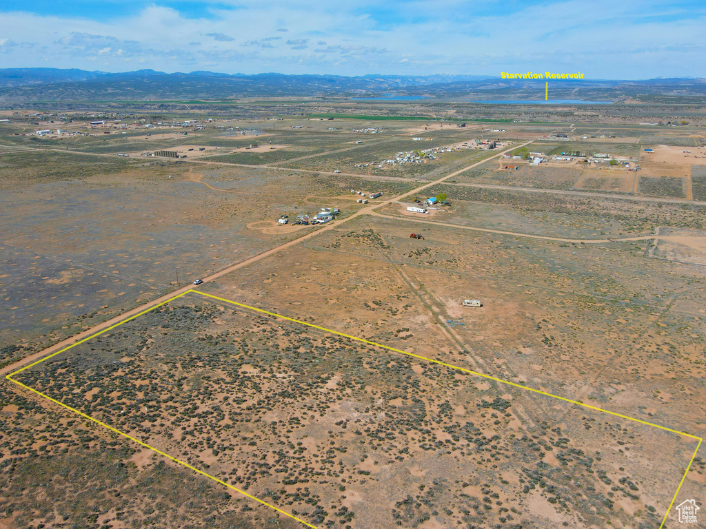 View of rural area with property boundaries highlighted and mountains