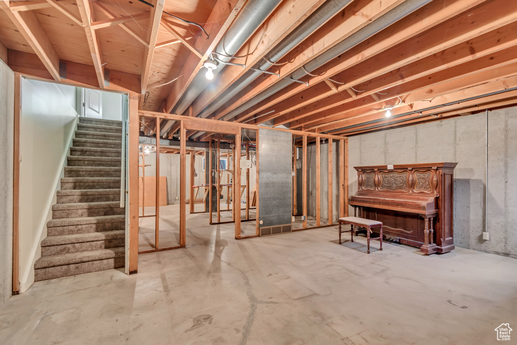 Unfinished below grade area with stairs