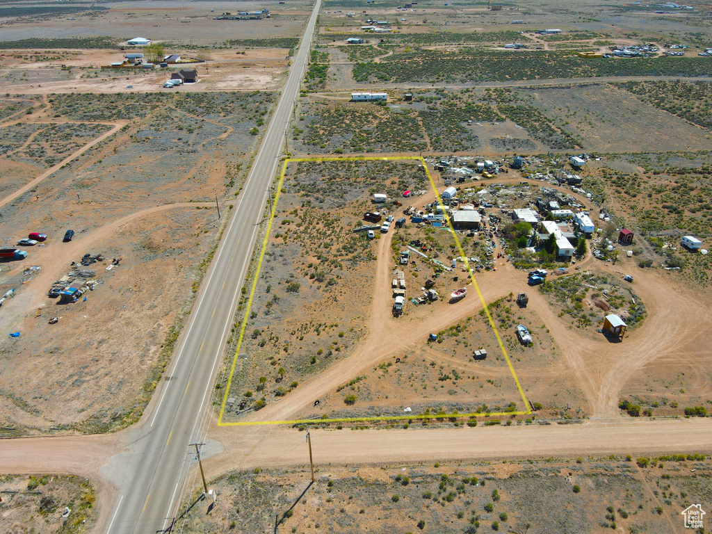 View of rural area featuring a desert landscape and property parcel outlined