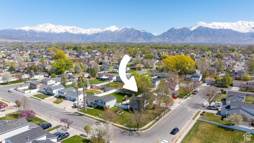 Aerial view featuring a mountain view and a residential view