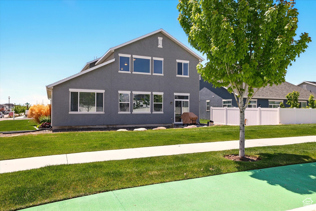 View of front of home featuring stucco siding
