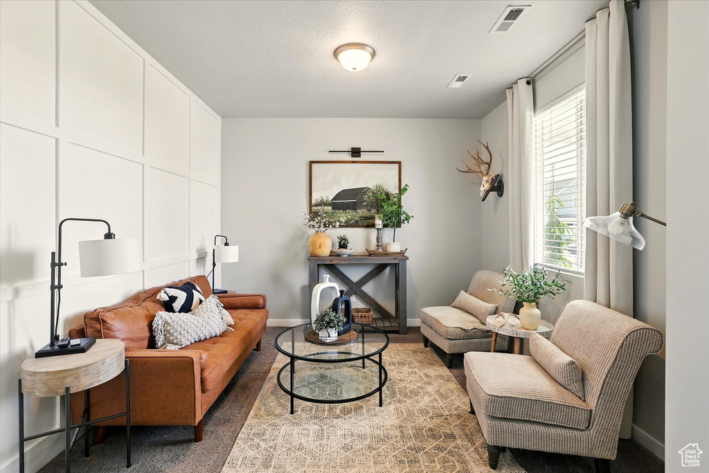 Living area featuring baseboards