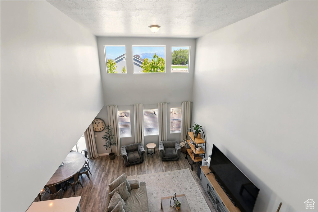 Living area featuring wood finished floors and baseboards