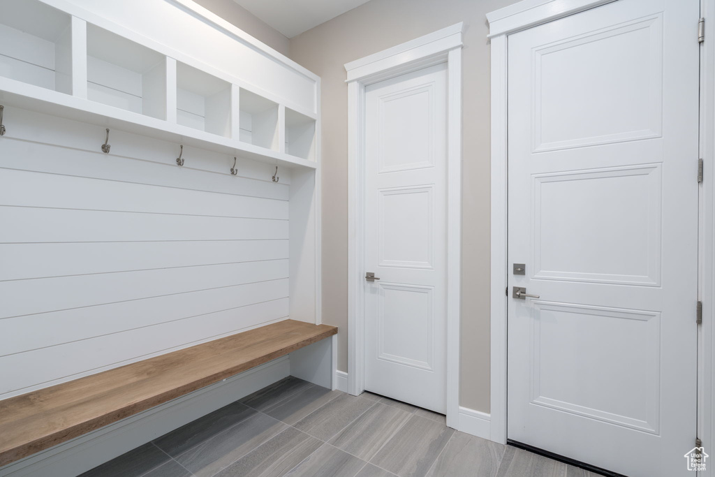 Mudroom featuring baseboards
