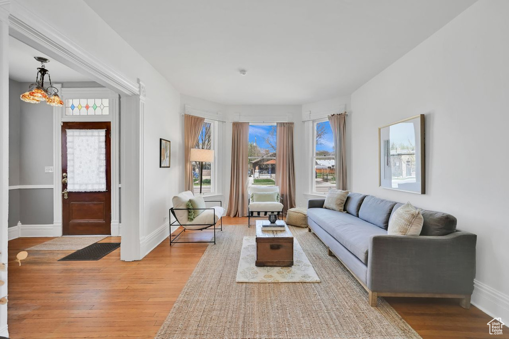 Living room featuring light wood finished floors and baseboards