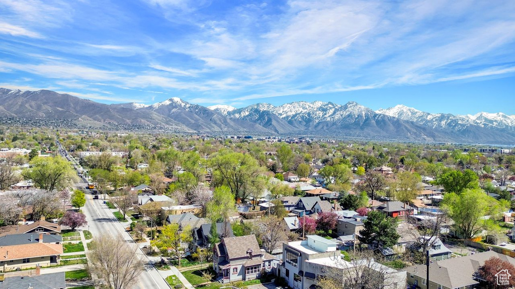 Birds eye view of property featuring a residential view and a mountain view