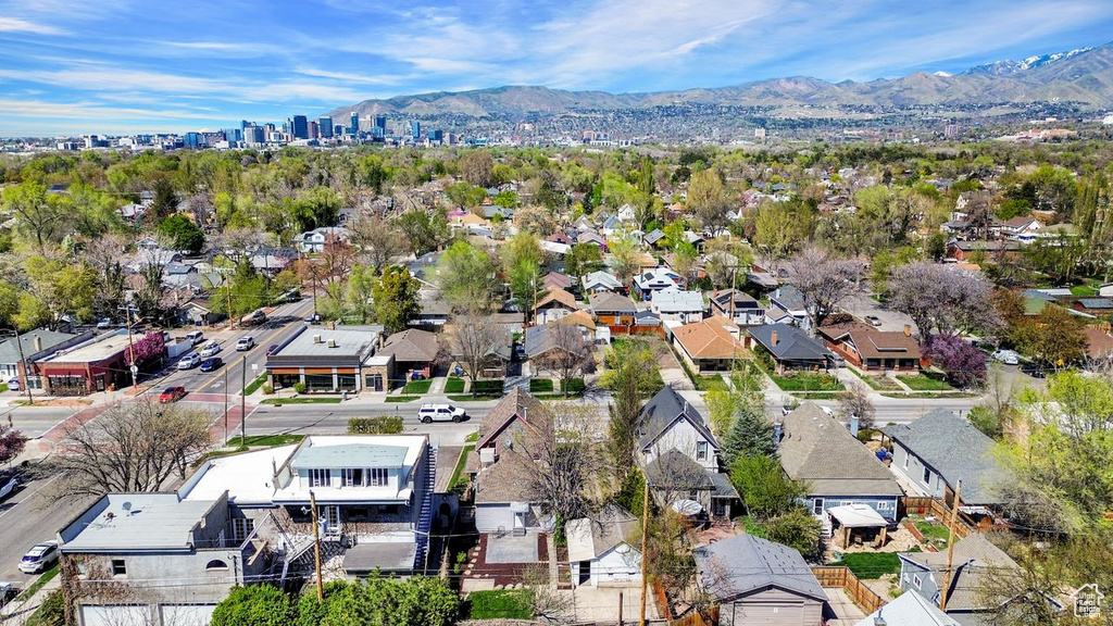 Birds eye view of property featuring a mountain view and a residential view