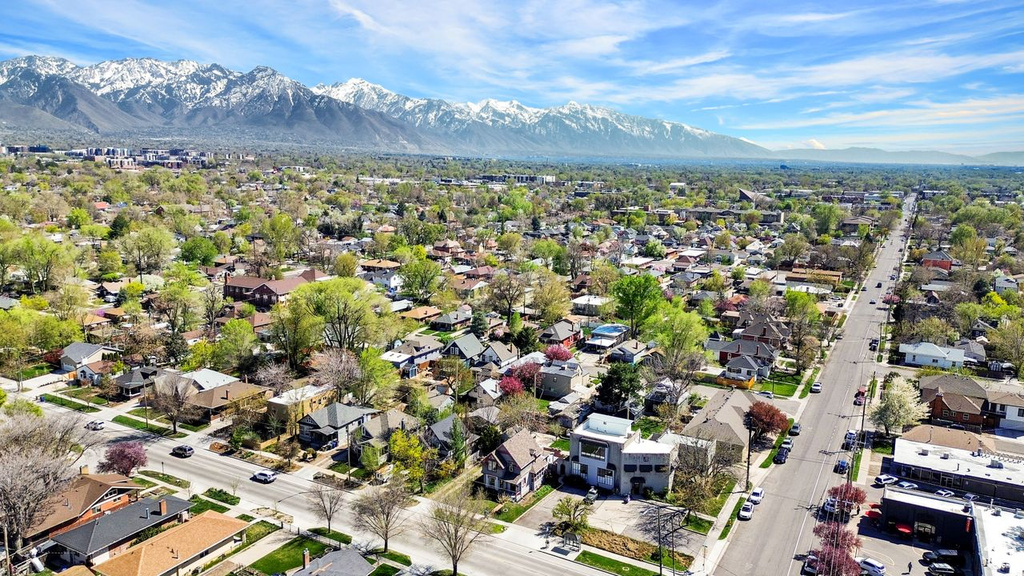 Drone / aerial view featuring a mountain view and a residential view
