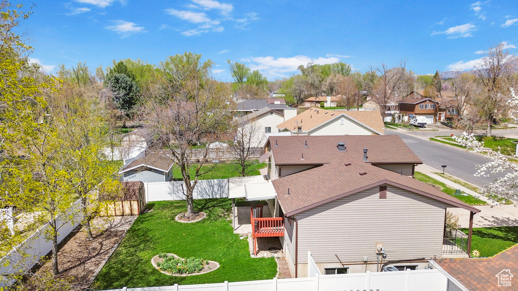 Birds eye view of property with a residential view