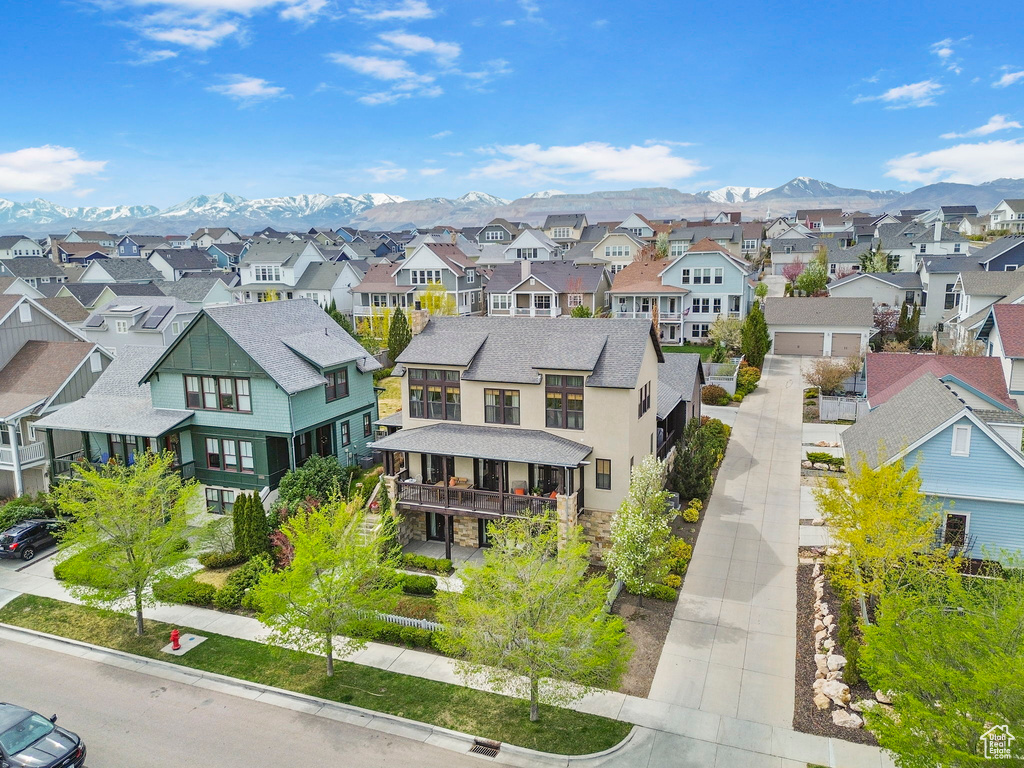 Birds eye view of property featuring a residential view and a mountain view