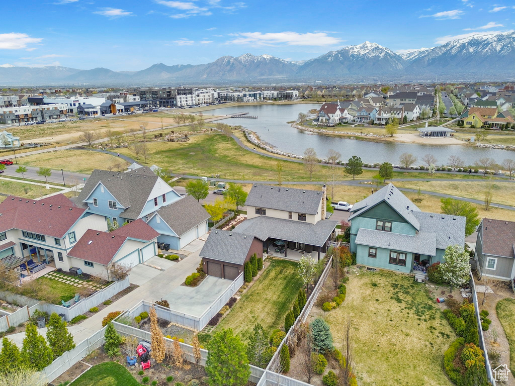 Bird's eye view with a water and mountain view and a residential view