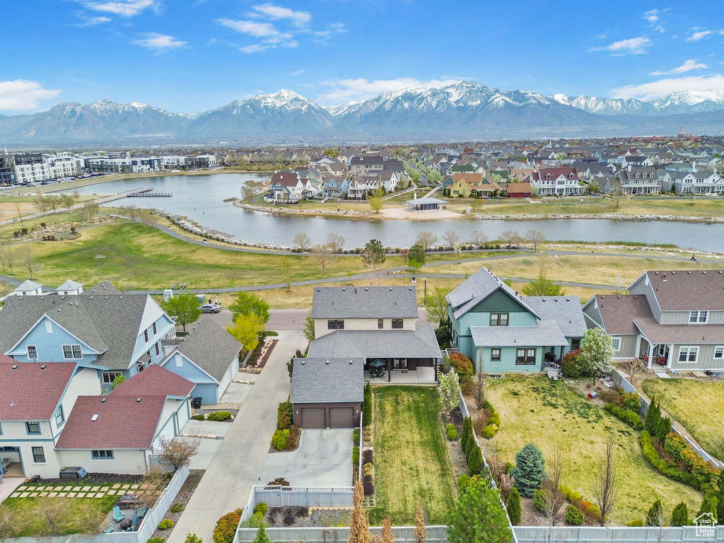 Bird's eye view with a water and mountain view and a residential view