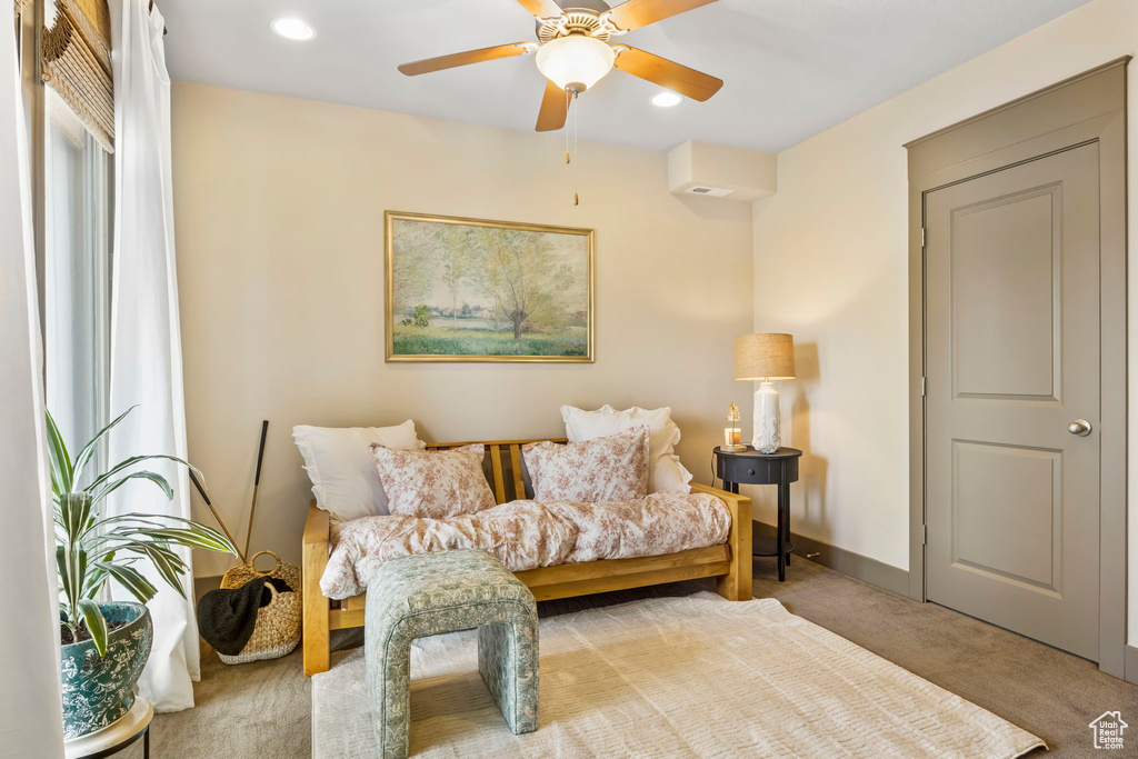 Sitting room with baseboards, a ceiling fan, carpet, and recessed lighting