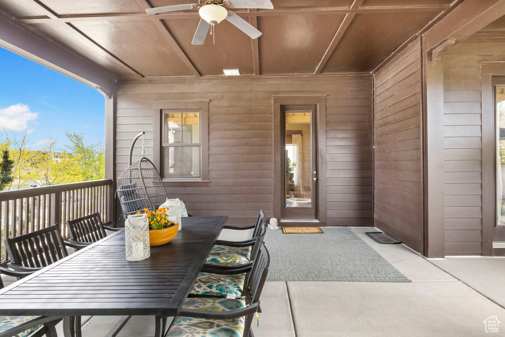 View of patio / terrace with outdoor dining space and a ceiling fan
