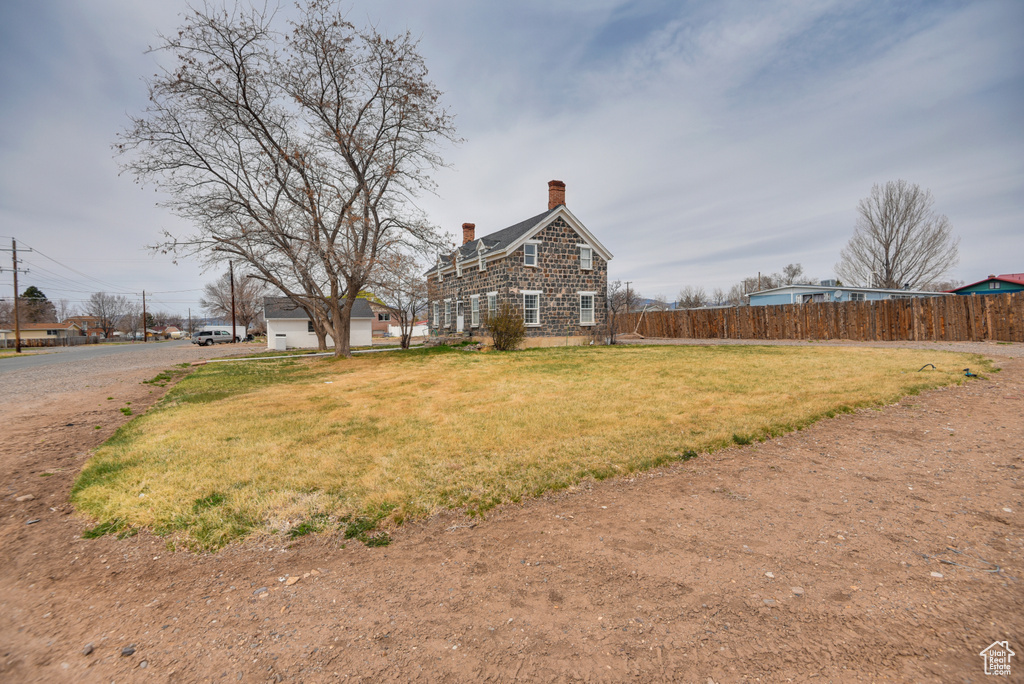 View of yard with fence